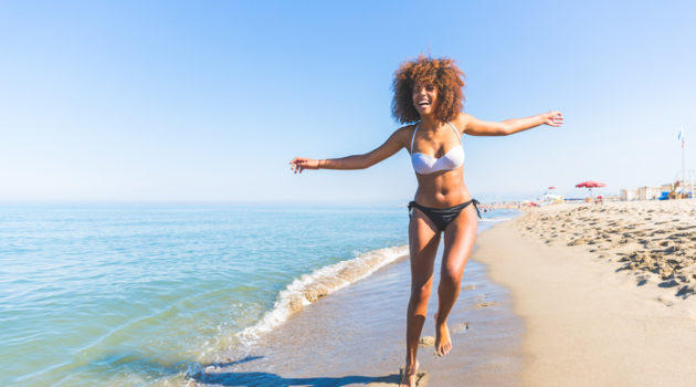 African American woman on the beach natural hair