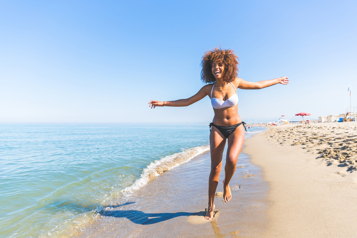 African American woman on the beach natural hair
