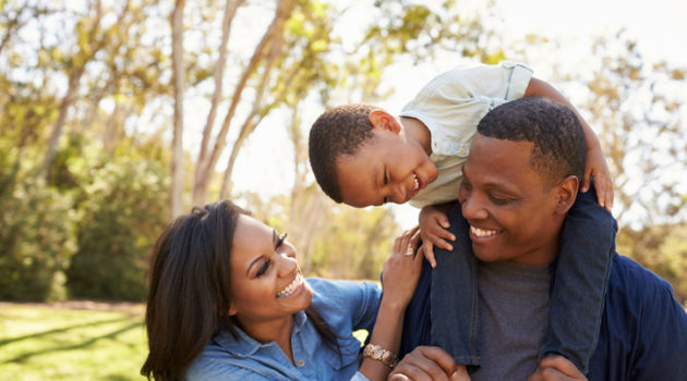 African american parents family and son outside