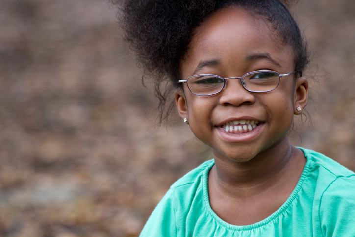 African American girl wearing glasses