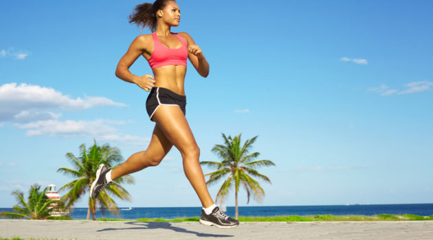 African American woman jogging running