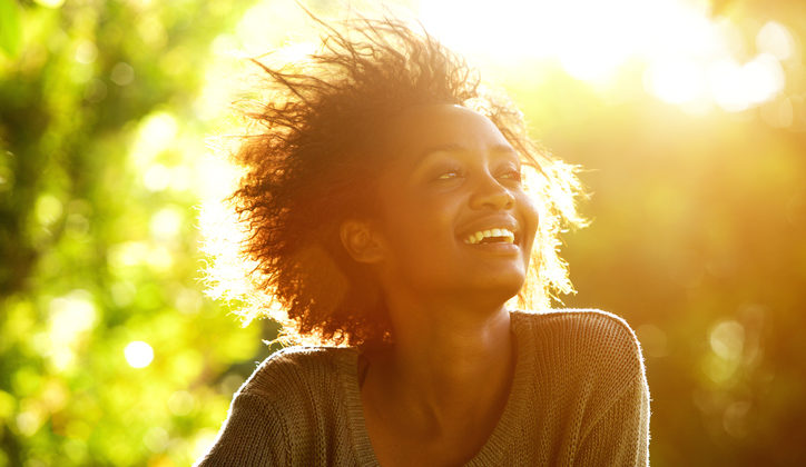 African American woman smiling sun