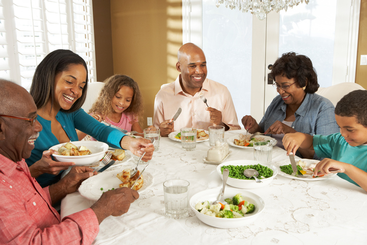 African American family eating meal