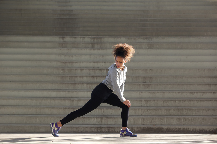 Young African American woman exercise leggings