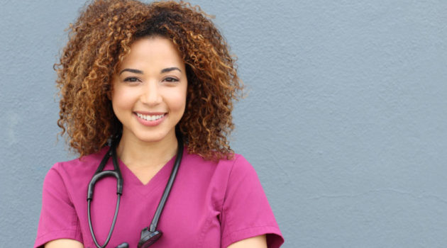 Black woman nurse with stethoscope.
