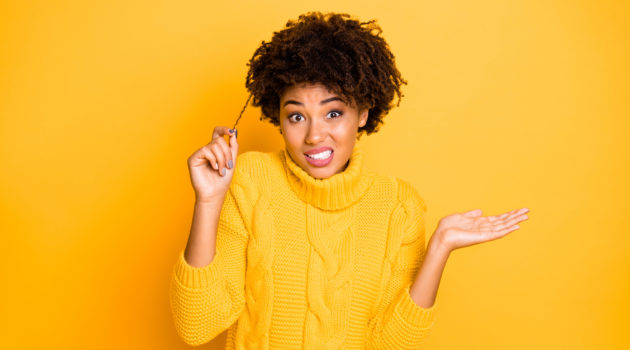 Photo of trendy misunderstanding dandruff haired girlfriend wearing yellow jumper not knowing how to care about hair while isolated with bright color background, how to take care of black male hair