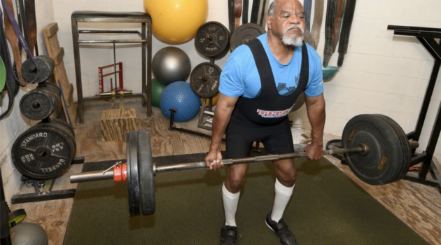 MAN PUSHES PAST CANCER & BLINDNESS TO WEIGHTLIFTING WORLD RECORD