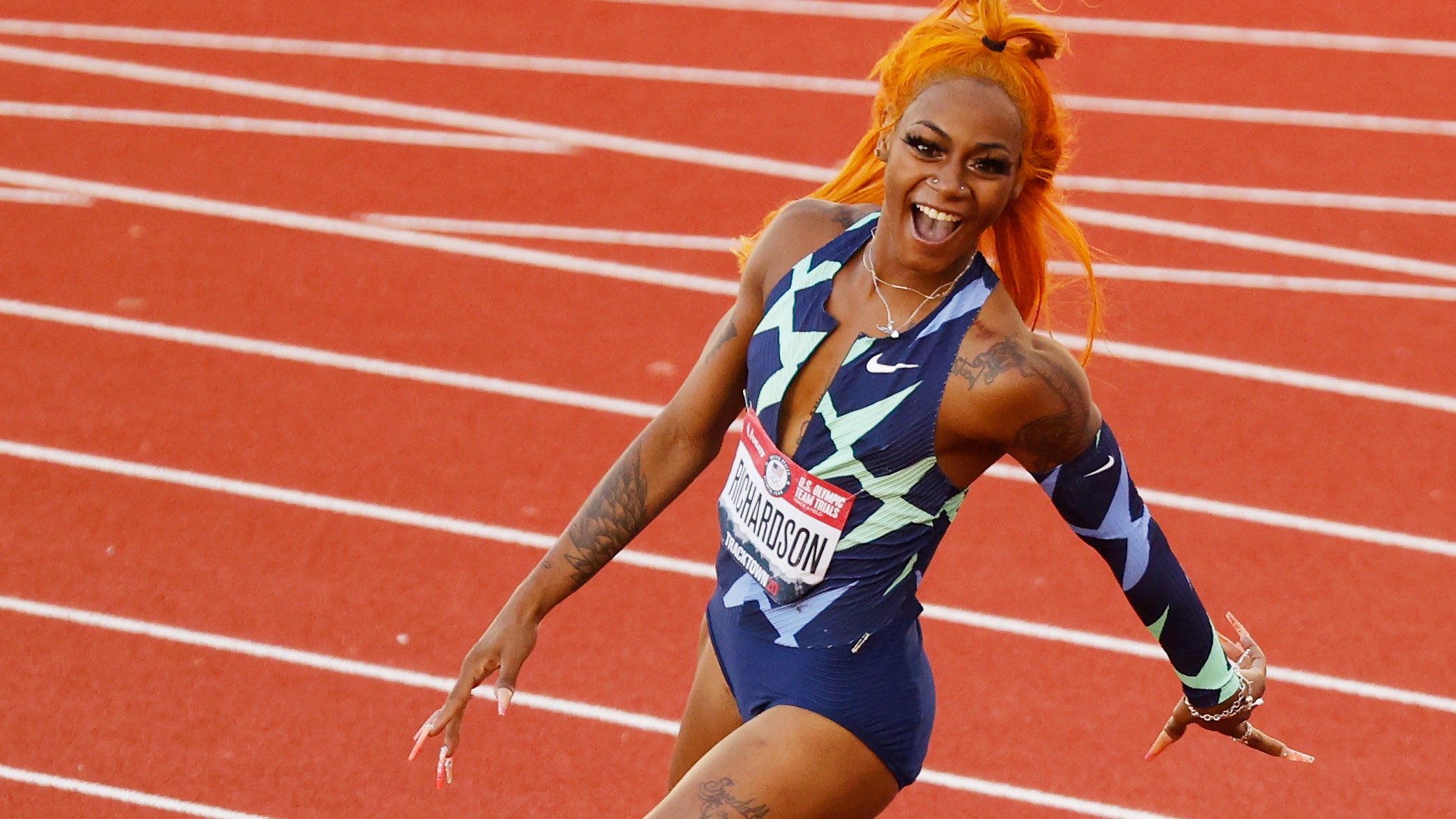 3. Meet the Rising Star of Track and Field: Blue-Haired Sprinter Dominates Competition - wide 2